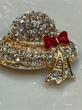 Gold Crystal Straw Hat Brooch with Red Enamel Bow
